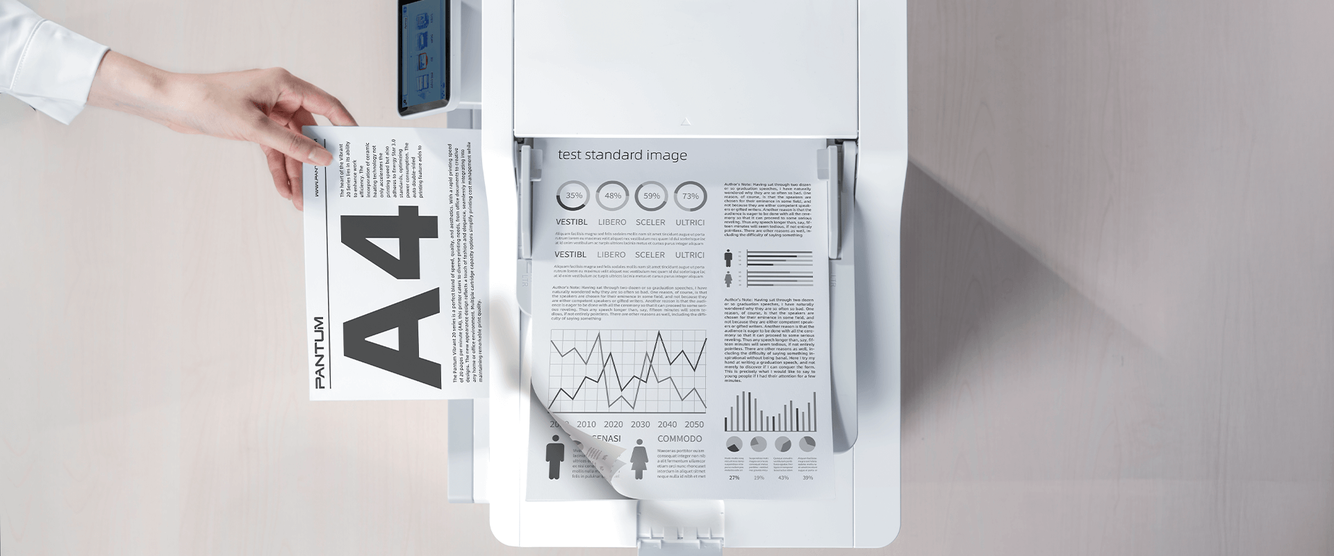 Máy in Pantum BM4302ADW đang quét tài liệu A4 với biểu đồ và dữ liệu