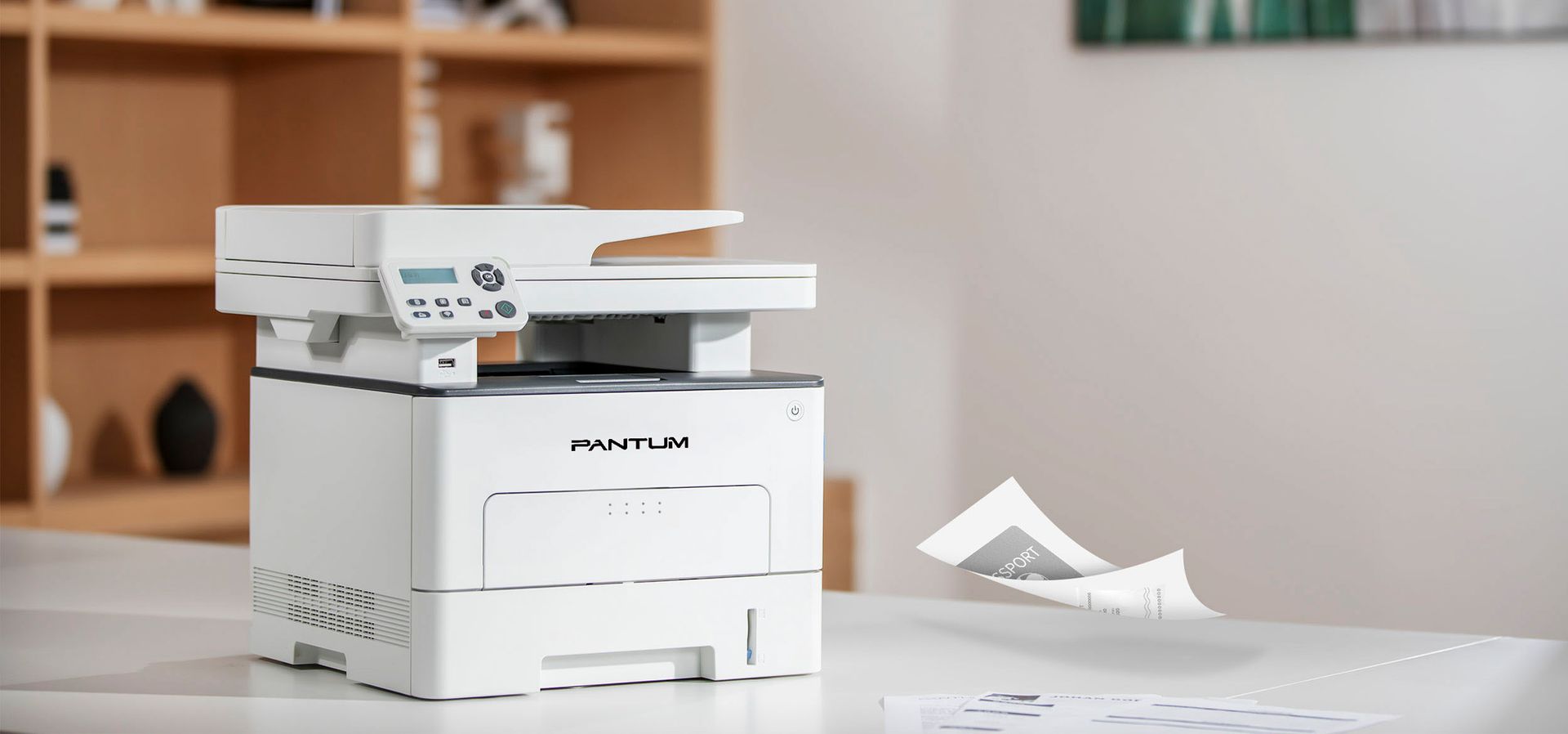 Máy in Pantum M6702DW đa năng nhưng tiện lợi, xử lý mọi vấn đề, nhu cầu thiết yếu Máy in Pantum M6702DW nhỏ gọn đặt trong phòng làm việc